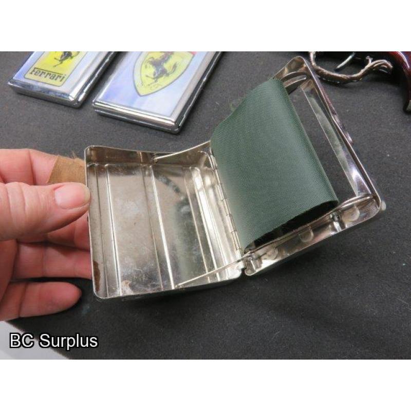 T-703: Cigarette Cases; Roller and Lighter – 4 Items